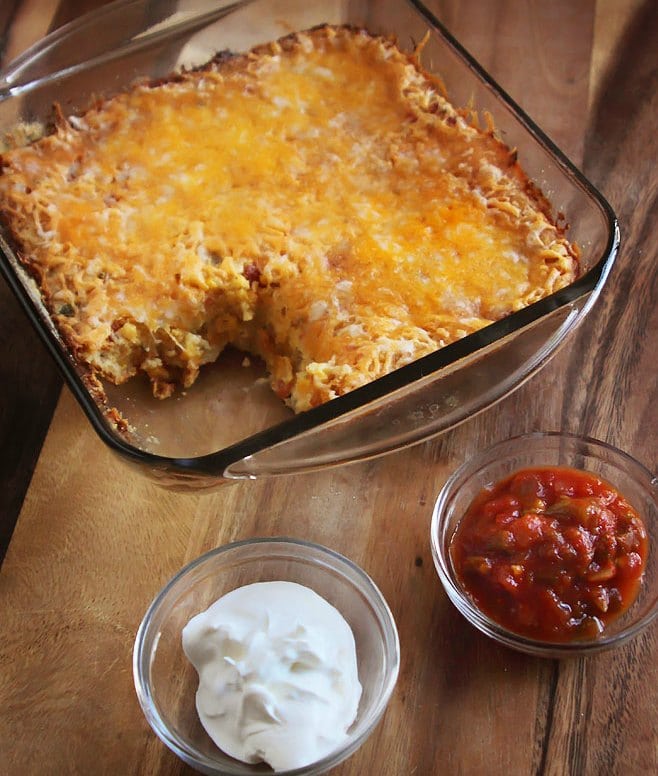 mexican corn casserole topped with cheese