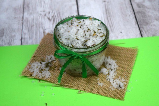 mint sugar scrub in a colored jar