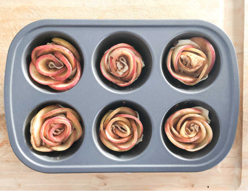 apple blossoms in muffin tin