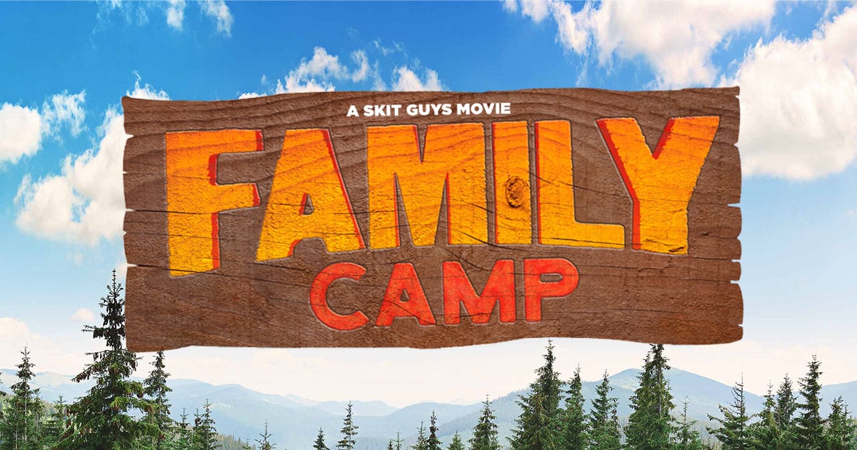 Family Camp sign in front of blue sky and trees