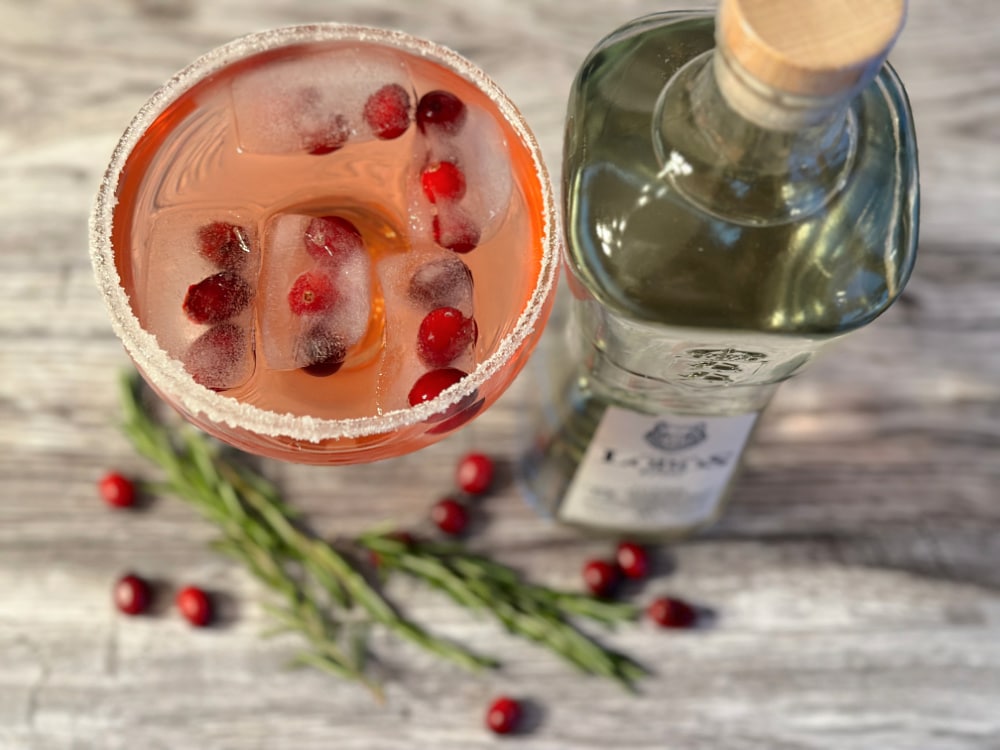 cranberry margarita and a bottle of tequila