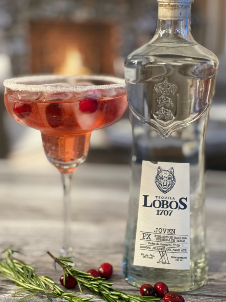 bottle of tequila and margarita