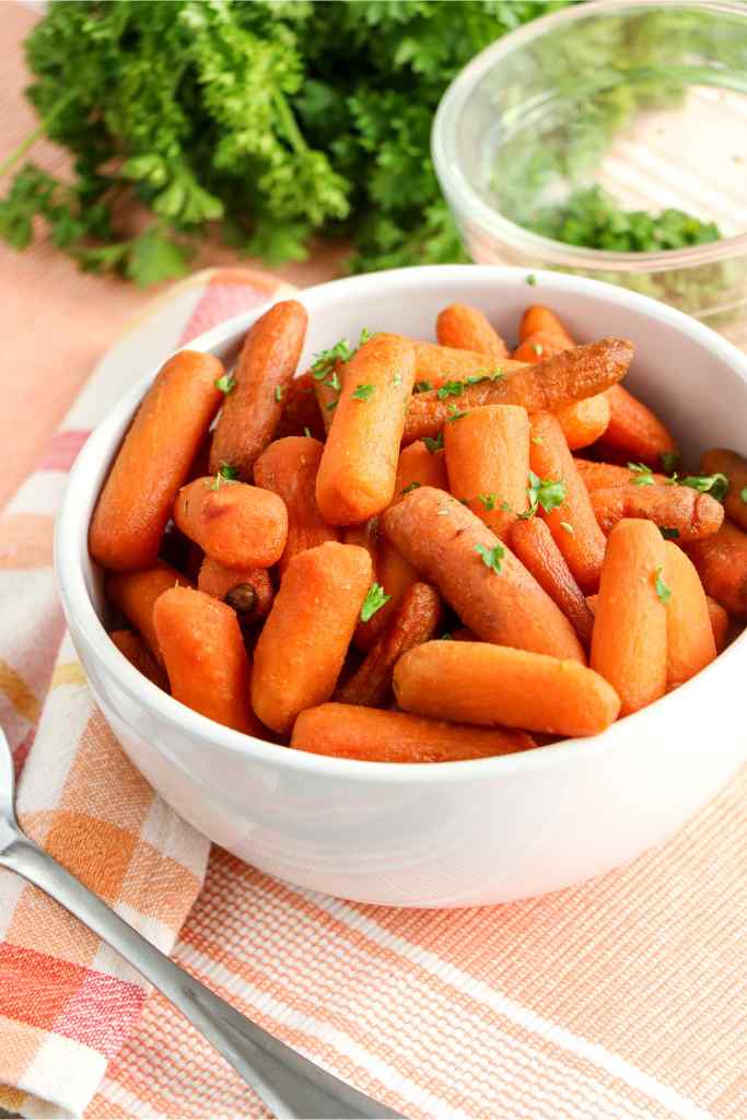 brown sugar carrots in a white bowl