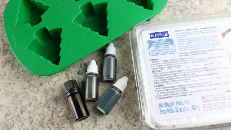 soap mold, blocks of glycerin, coloring and essential oils on a table